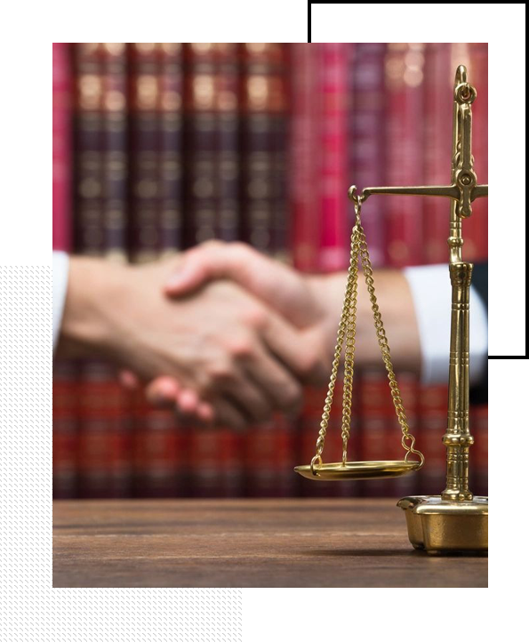 Justice Scale On Table With Judge And Client Shaking Hands